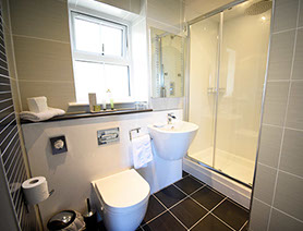 En Suite Shower Rooms with Electric Towel Rails Anti Steam Mirrors at Heatherfield House