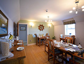 Heatherfield House Bed and Breakfast near Portree contains a large breakfast room where a full cooked or continental breakfast is served