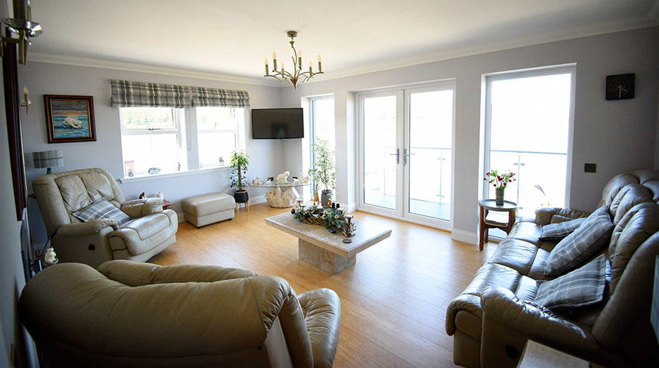 Stay in a comfortable guest living room at Heatherfield House Bed and Breakfast Accommodation near Portree