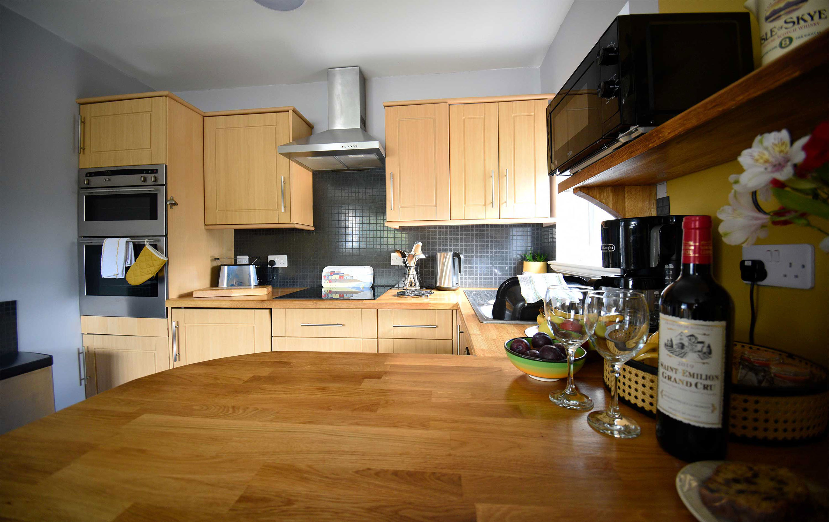 Heatherfield House Self Catering Accomodation contains a Modern Kitchen with Oven Hob Microwave and Coffee Machine